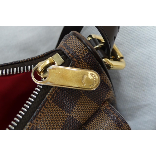 201 - Louis Vuitton, Paris, brown leather chequered handbag with gold plated fittings, leather belt handle... 