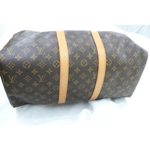 203 - Louis Vuitton Paris 'womans keepall' imitation dark brown leather with LV designs, tan leather handl... 