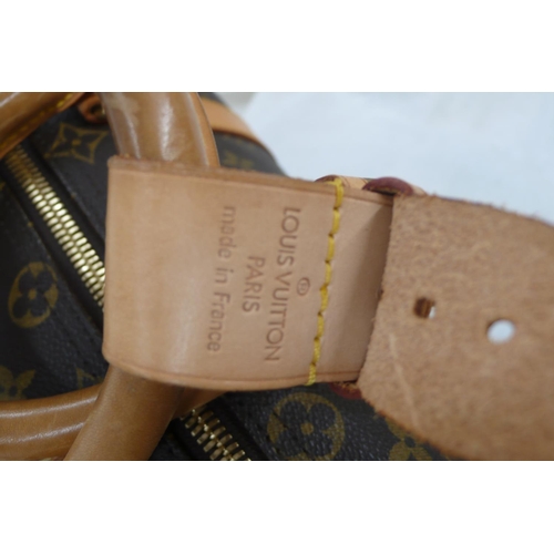 203 - Louis Vuitton Paris 'womans keepall' imitation dark brown leather with LV designs, tan leather handl... 