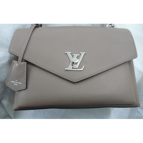 204 - AMENDED DESCRIPTION - Louis Vuitton Paris 'Mylockme' satchel handbag in beige leather taurillon clem... 