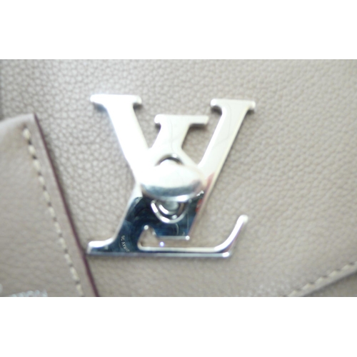 204 - AMENDED DESCRIPTION - Louis Vuitton Paris 'Mylockme' satchel handbag in beige leather taurillon clem... 