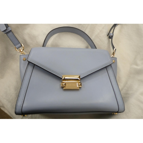 207 - Michael Kors pale blue leather handbag with shoulder and short handle, gold plated fittings, outside... 