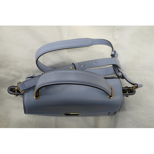 207 - Michael Kors pale blue leather handbag with shoulder and short handle, gold plated fittings, outside... 