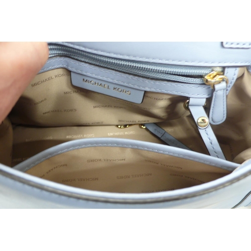 207 - Michael Kors pale blue leather handbag with shoulder and short handle, gold plated fittings, outside... 