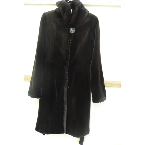 210 - Ladies dark brown cropped mink 3/4 length coat with hood having rope twist style border, leopard pri... 