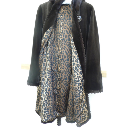 210 - Ladies dark brown cropped mink 3/4 length coat with hood having rope twist style border, leopard pri... 