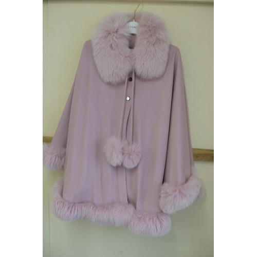 212 - Ladies pink cashmere poncho with pink fox fur collar, trim and pom poms size 12