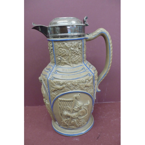 222 - Mid 19thC silver topped German jasperware wine jug with decoration in relief, repair to base London ... 