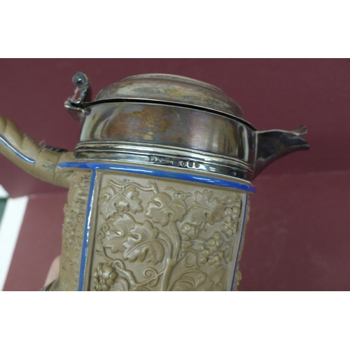 222 - Mid 19thC silver topped German jasperware wine jug with decoration in relief, repair to base London ... 