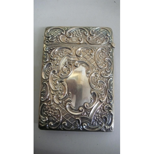 98 - An Edwardian silver card case with chased decoration of a sheep dog 'on guard' - Birmingham 1907 - 2... 