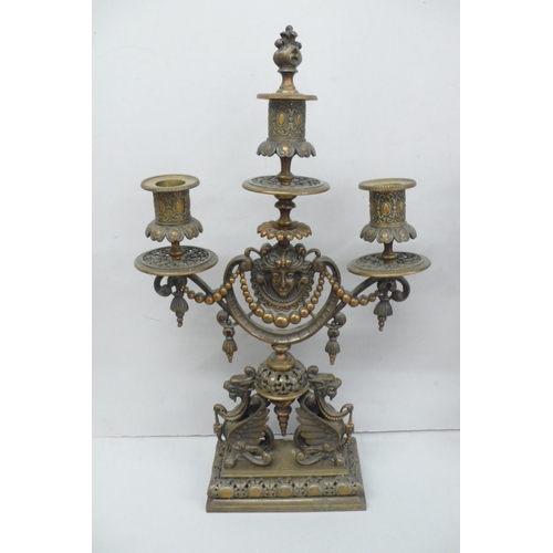 240 - Pair of late Victorian ornate brass three branch candelabra with flaming torch finial, decoration of... 