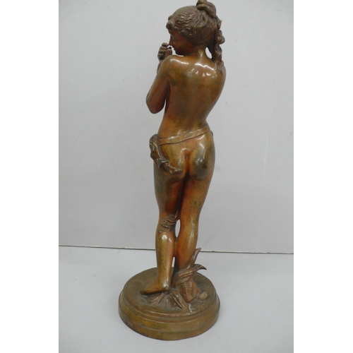 242 - R. Cajani, Nude woman holding a dover, brown patinated bronze - height 12.5ins