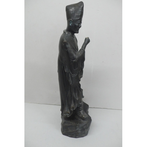 245 - 19th/20thC Japanese black patinated bronze of a man in hat, robes and boots - height 15ins