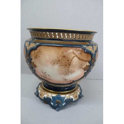 264 - Hadley's Worcester porcelain vase with pierced border peacock decoration to cartouches on four splay... 