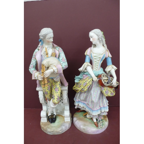 268 - Fine pair of Meissen large porcelain figures man with bag pipes and woman with Hurdy Gurdy, undergla... 