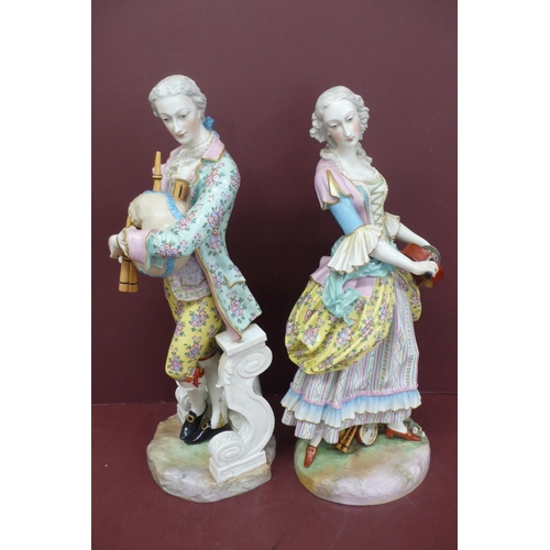 268 - Fine pair of Meissen large porcelain figures man with bag pipes and woman with Hurdy Gurdy, undergla... 