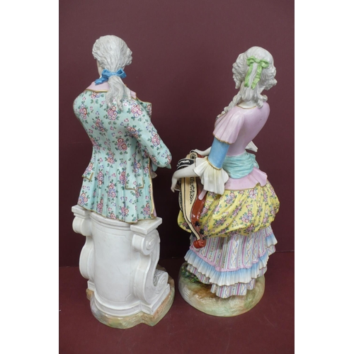 268 - Fine pair of Meissen large porcelain figures man with bag pipes and woman with Hurdy Gurdy, undergla... 