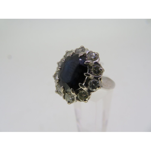 295 - 18 ct. white gold oval sapphire and diamond cluster ring, sapphire 3 ct. approx., 1 ct. diamonds app... 