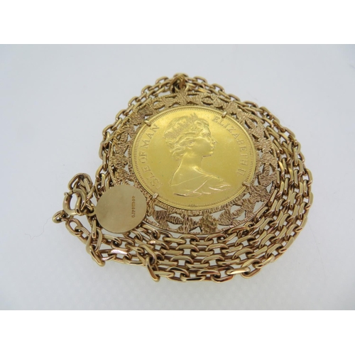 297 - Gold coin pendant necklace 1974 Isle of Man £5 set in 9 ct. gold frame with 9 ct. gold chain