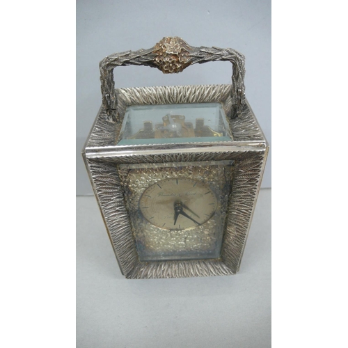 57 - Stuart Devlin heavy silver carriage clock with flower and leaf decration to handle, leaf decoration ... 