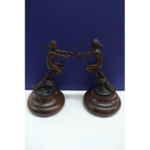 370 - Greco?, Nude girls flying on broom sticks above owls, bronze on wooden stepped pedestals height 7.5i... 