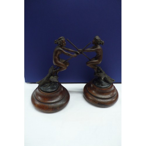 370 - Greco?, Nude girls flying on broom sticks above owls, bronze on wooden stepped pedestals height 7.5i... 