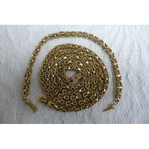 373 - Boodle and Dunthorpe 18 ct. gold complicated knot and link necklace and matching bracelet - necklace... 