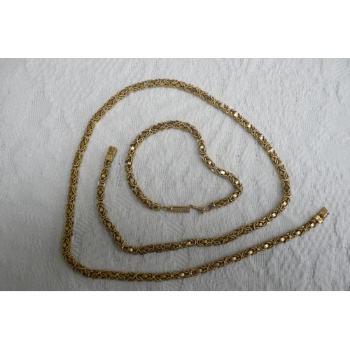 373 - Boodle and Dunthorpe 18 ct. gold complicated knot and link necklace and matching bracelet - necklace... 