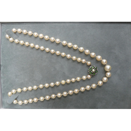 374 - Boodle and Dunthorpe graduated cultured Pearl necklace with an 18 ct. white gold peridot and diamond... 