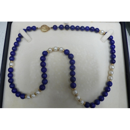 377 - 14 ct. gold lapis lazuli and pearl necklace