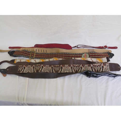 57 - Collection of various guitar straps including Gibson