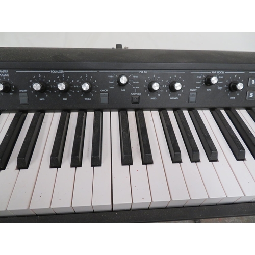 135 - Korg SV1 Stage Vintage synthesizer together with two stands