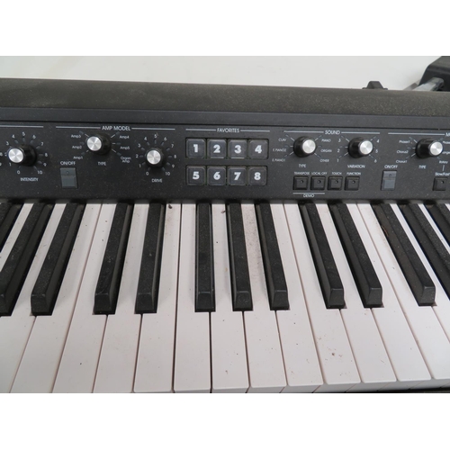 135 - Korg SV1 Stage Vintage synthesizer together with two stands