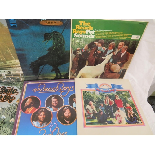 11 - Extensive collection of The Beach Boys LPs including Pet Sounds, Smiley Smile, Holland, Surfs Up, et... 