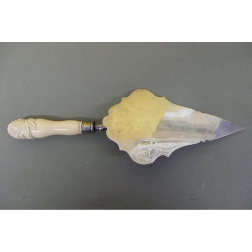 8 - An ornate silver and carved bone handled bricklayers trowel, presented to Alexander Gill Esq. by the... 