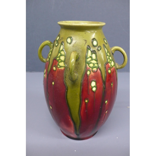 46 - An Art Nouveau Minton Ltd No.44 secessionist period earthenware vase probably designed by John Wadsw... 