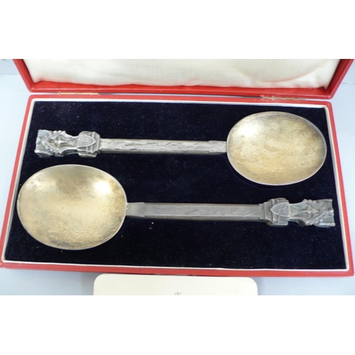 103 - Cased pair of large silver gilt metal novelty spoons having the Cross of St Maughold to tops with ca... 