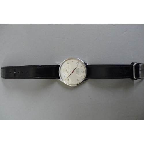 108 - Gents Nomos Glashütte Neomatik, 27 rubine No.10942 SS Wristwatch with original black leather strap. ... 