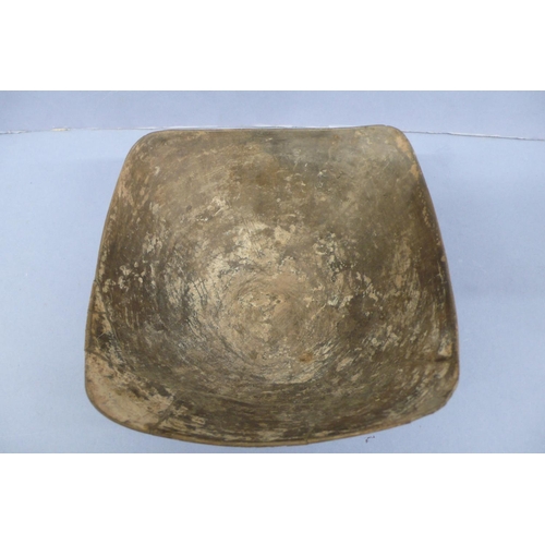 125 - An Argentinian pottery bowl with circular base, flaring to a square shaped top with concave edges, d... 