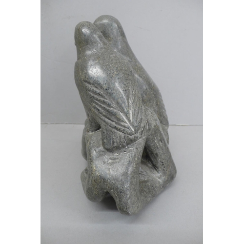 138 - Innuit soap stone sculpture of two penguins standing on a rock.
Signed to base BH, No. 4-29920, Ht. ... 
