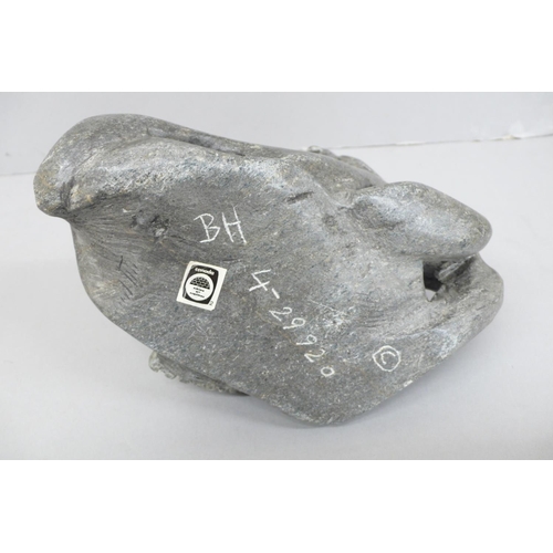 138 - Innuit soap stone sculpture of two penguins standing on a rock.
Signed to base BH, No. 4-29920, Ht. ... 