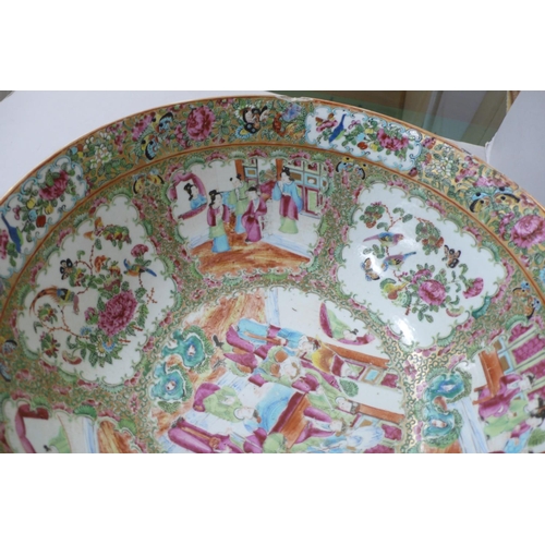 146 - A 19thC Canton Porcelain punch bowl with decoration of cartouches of figures, birds and insects, Dia... 