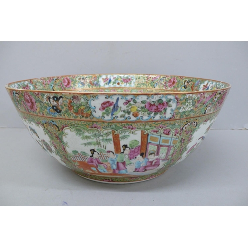 146 - A 19thC Canton Porcelain punch bowl with decoration of cartouches of figures, birds and insects, Dia... 