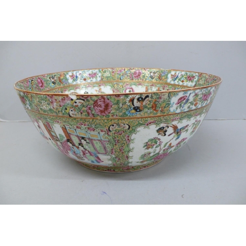 146 - A 19thC Canton Porcelain punch bowl with decoration of cartouches of figures, birds and insects, Dia... 