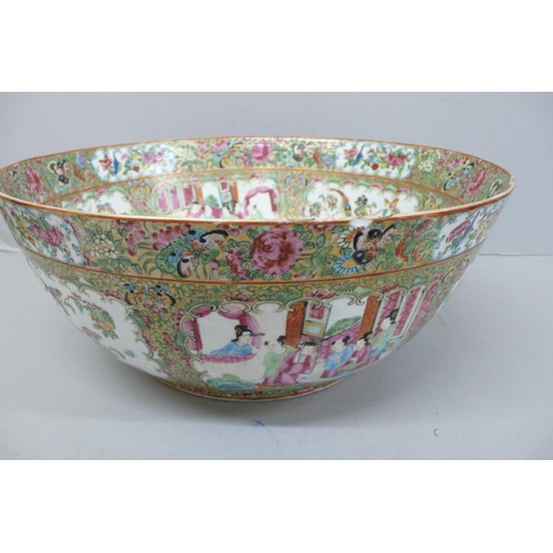 146 - A 19thC Canton Porcelain punch bowl with decoration of cartouches of figures, birds and insects, Dia... 