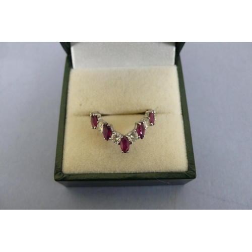 178 - 18ct white gold wishbone ring with marquise shaped rubies and brilliant cut diamonds. Size M/N