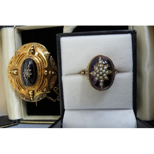 181 - Victorian style 9ct gold ring with cabochon garnet inset with gold set star of seed pearls, Size M. ... 