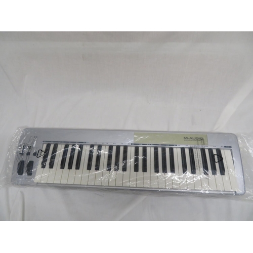 213 - M-Audio boxed midi keyboard