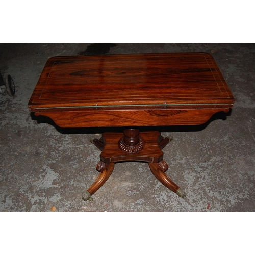 69 - Regency Rosewood Swivel Top Folding Card Table with Brass stringing on Sabre Legs