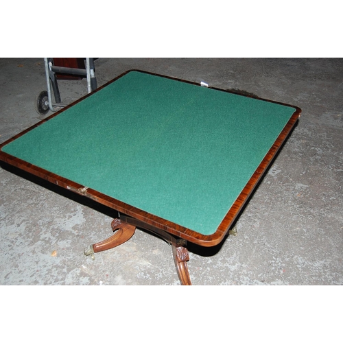 69 - Regency Rosewood Swivel Top Folding Card Table with Brass stringing on Sabre Legs